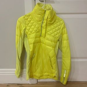 Bright yellow Lululemon pullover coat